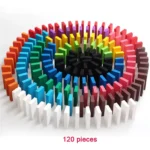Colorful wooden dominoes arranged in a circular pattern, showcasing a vibrant spectrum of colors including red, orange, yellow, green, blue, purple, black, and white.