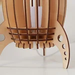 Wooden rocket model kit with detailed design, perfect for science education, decor, and educational toys. Crafted from natural wood, it features intricate cutouts and a sturdy base.