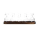 Glass test tubes on wooden stand for science experiments and educational demonstrations.