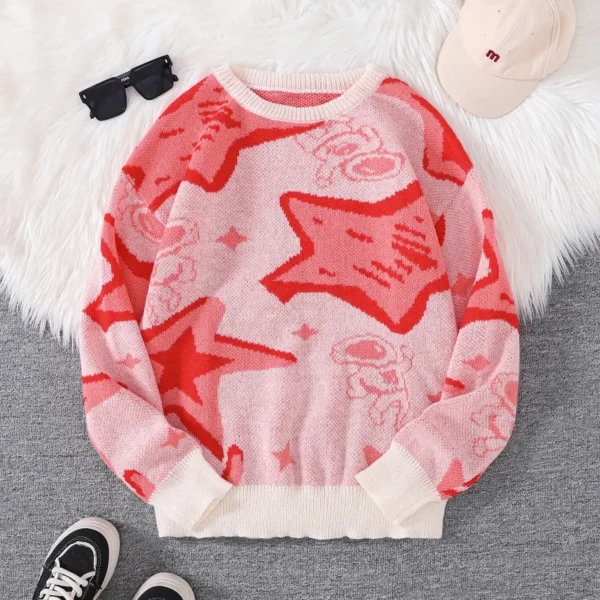 Cozy pink sweater with red star and moon patterns, perfect for casual wear and adding a fun touch to your wardrobe.