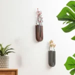 Stylish wall-mounted planters with dried botanical arrangements, perfect for adding a natural touch to home decor.