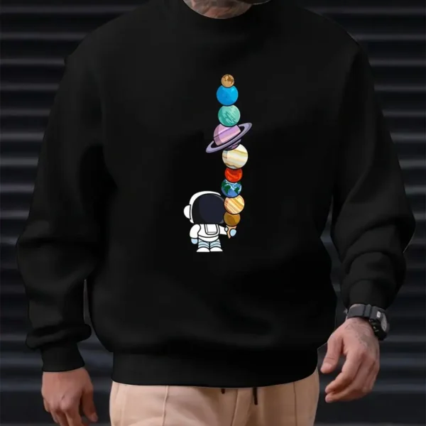 Astronaut graphic sweatshirt featuring planets and space elements, perfect for science and space fans.