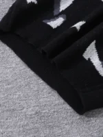 Pull noir avec motifs scientifiques en gris et blanc, parfait pour les amateurs de science et de design moderne.