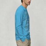 Blue long-sleeve shirt with science-themed illustrations and diagrams.