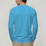 Bright blue long-sleeve shirt worn by a man, viewed from the back, against a plain light background.