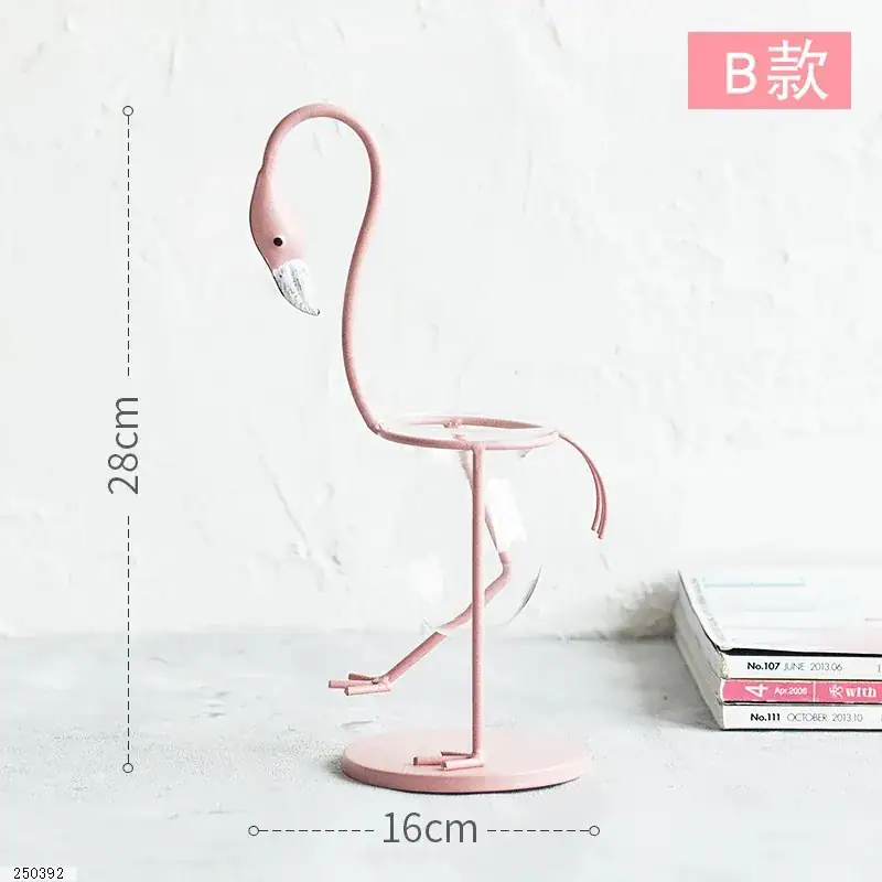 A pink flamingo-shaped desk lamp with a height of 28cm and a width of 16cm, designed for stylish home or office decor and educational purposes.