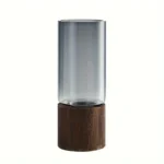 Modern glass vase with a wooden base, ideal for home decor and floral arrangements.