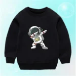 Children's black sweatshirt featuring a playful cartoon astronaut with a helmet, standing in a space pose. Perfect for kids interested in space, science, and exploration themes.