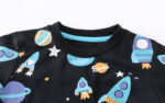 Children's sweatshirt featuring rockets, planets, and stars, perfect for science-themed decor and educational toys.
