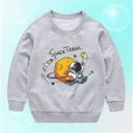 Children's sweatshirt featuring a fun space travel design with an astronaut, rocket, and planets, perfect for young science enthusiasts.