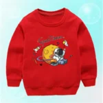 Red children's sweatshirt featuring a fun space-themed design with an astronaut, planets, and rockets, perfect for kids interested in science and space exploration.