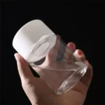 A clear glass container with a white lid, perfect for science experiments or educational demonstrations.