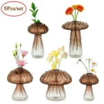Decorative glass mushroom-shaped vases with colorful artificial flowers, perfect for home decor or educational displays.