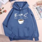 Blue hoodie featuring a playful E=MC² formula with a coffee cup illustration, perfect for science and coffee lovers.
