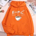Bright orange hoodie featuring Einstein's E=MC² formula and a coffee cup illustration, perfect for science enthusiasts and casual wear.
