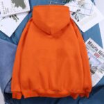 Vibrant orange hoodie made from soft, cozy fabric, perfect for casual outings, lounging, or outdoor activities. Features a front pocket and adjustable hood for added comfort and style.
