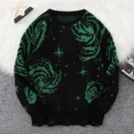 Cozy black sweater featuring green swirling galaxy patterns and star motifs, perfect for science and space enthusiasts.